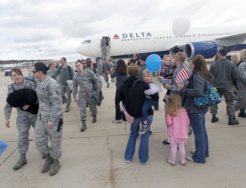 Al Hartmann  |  The Salt Lake Tribune
Friends and family members greet the return of1 50 airmen from the 388th Fighter Wing at Hill Air Force Base Monday April 22 from a six-month deployment to Kunsan Air Base, Republic of Korea. The pilots, maintainers and personnel provided F-16 air support in the region as part of a routine U.S. Pacific Command's Theater Security Package rotation.